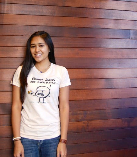 DSC_0035 a woman wearing a shirt that says skinny jeans are over rated with an illustration of a cartoon eating tacos