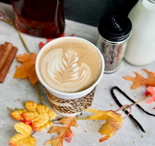 a cup of coffee on a table