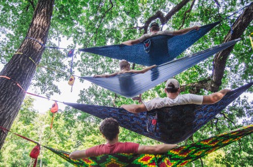 people lying in hammocks