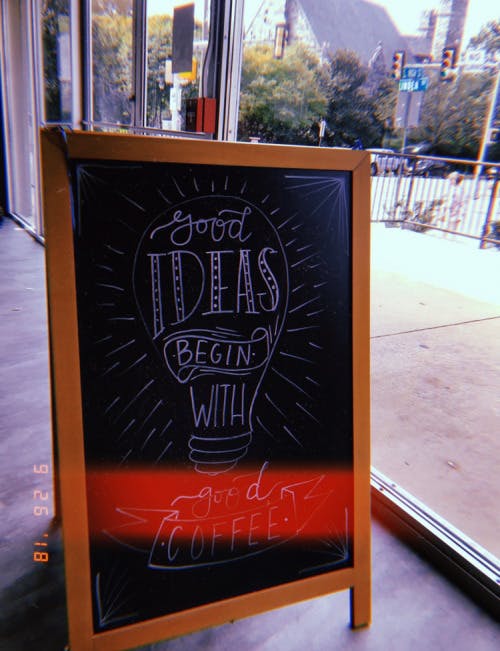 a sign on a chalk board