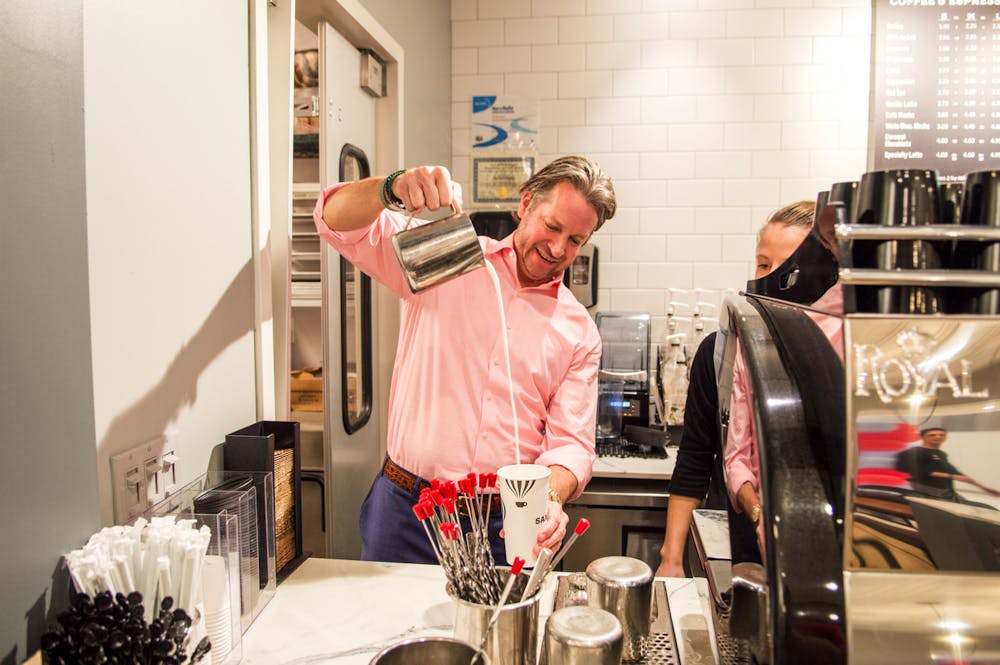 a person standing in a kitchen