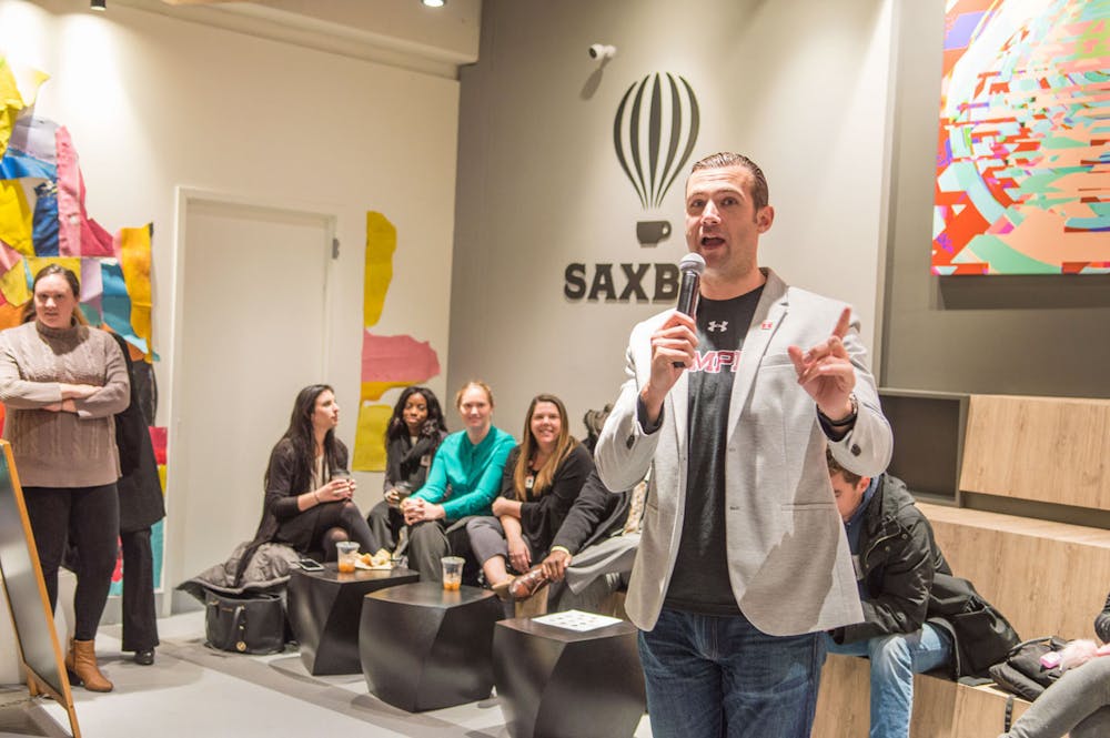 a group of people standing in a room