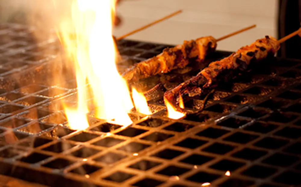 Meat Cooking on our Open Fire Grill