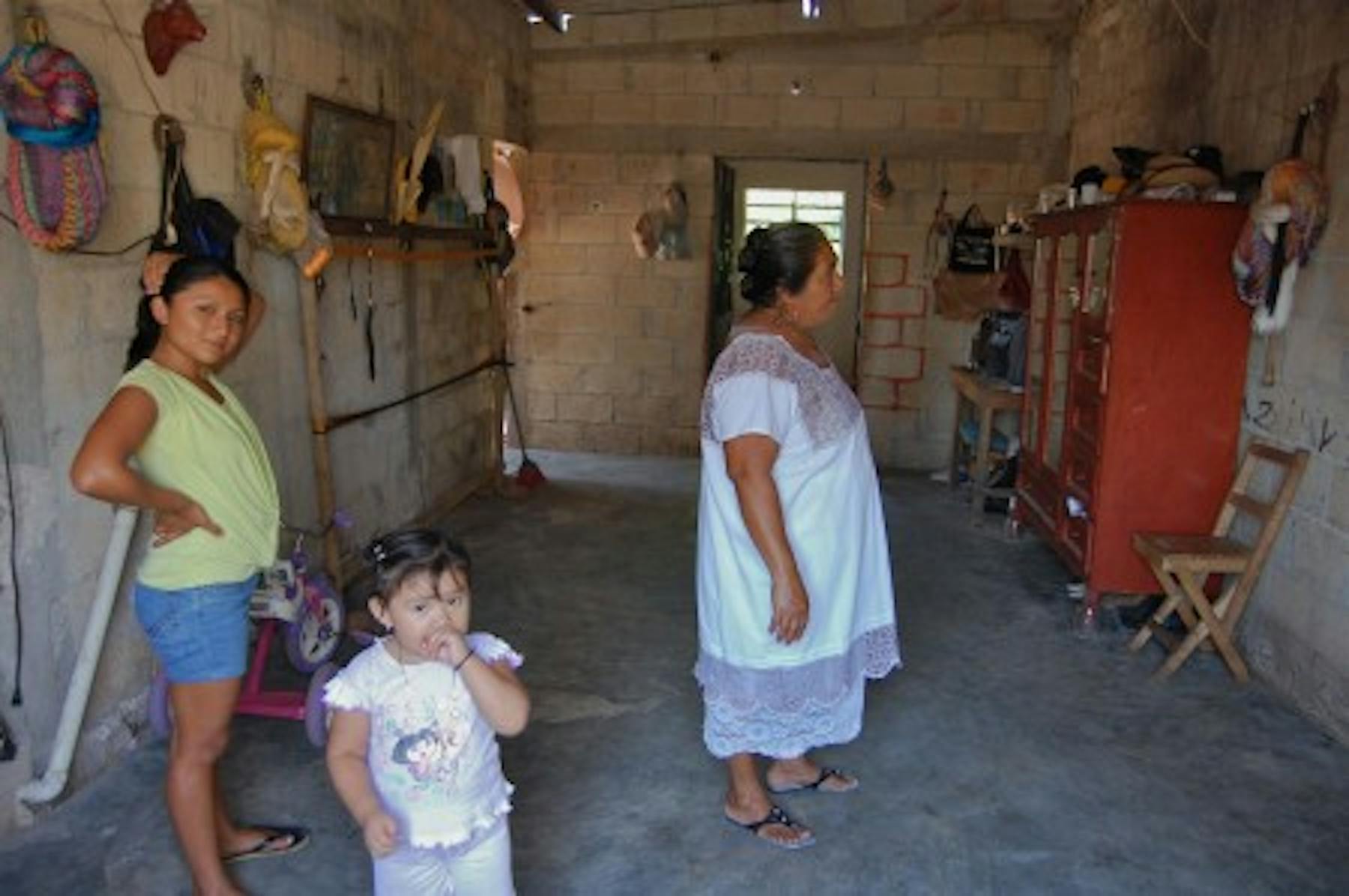 Lydia and her kids giving a house tour