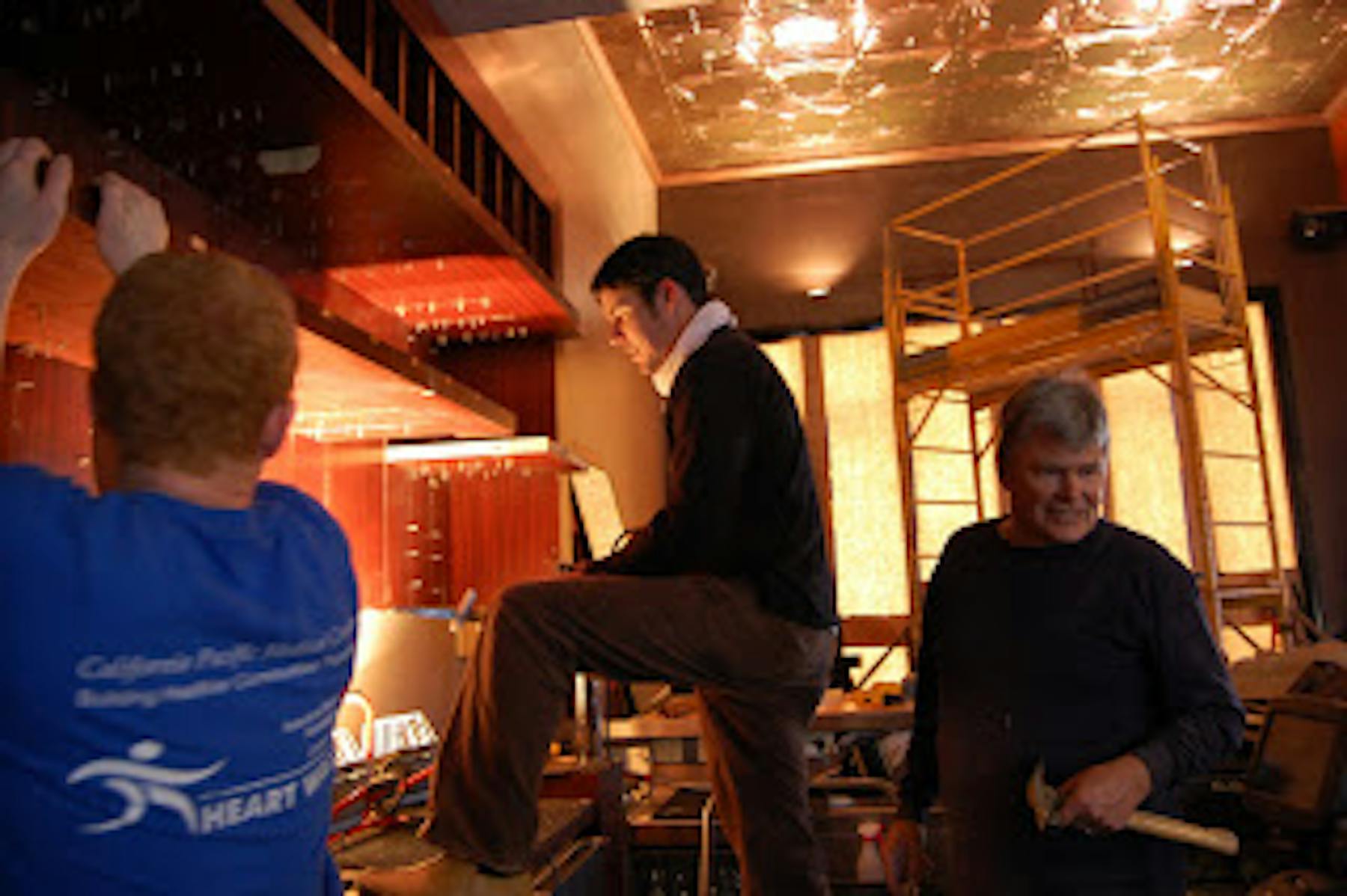 three men working in a construction
