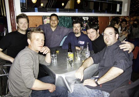 IMG_0835 a group of men posing for a photo