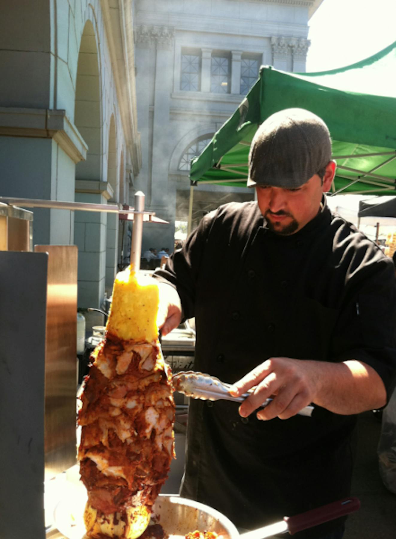 Telmo, on his way to mastering the al pastor spit.